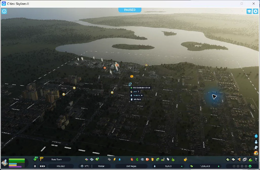 17:40 — The city at the start: 10,473 residents, established neighborhoods, and service warning icons. The session began with ₡1,226,503.