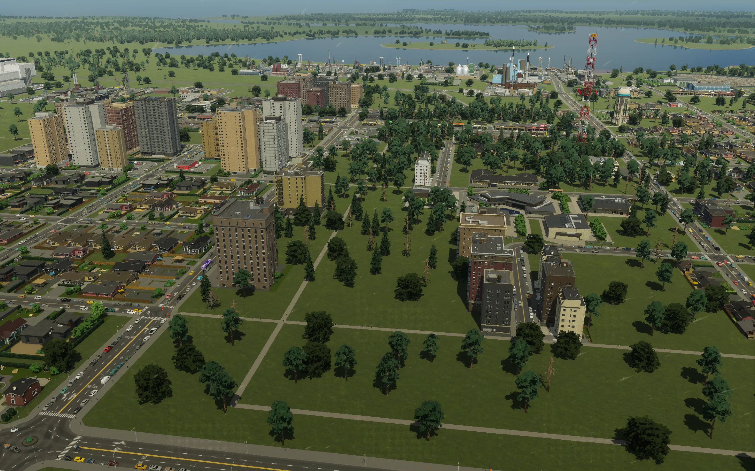 The interior strip before the alley and its residential zoning. Existing streets and school grounds frame the opportunity.