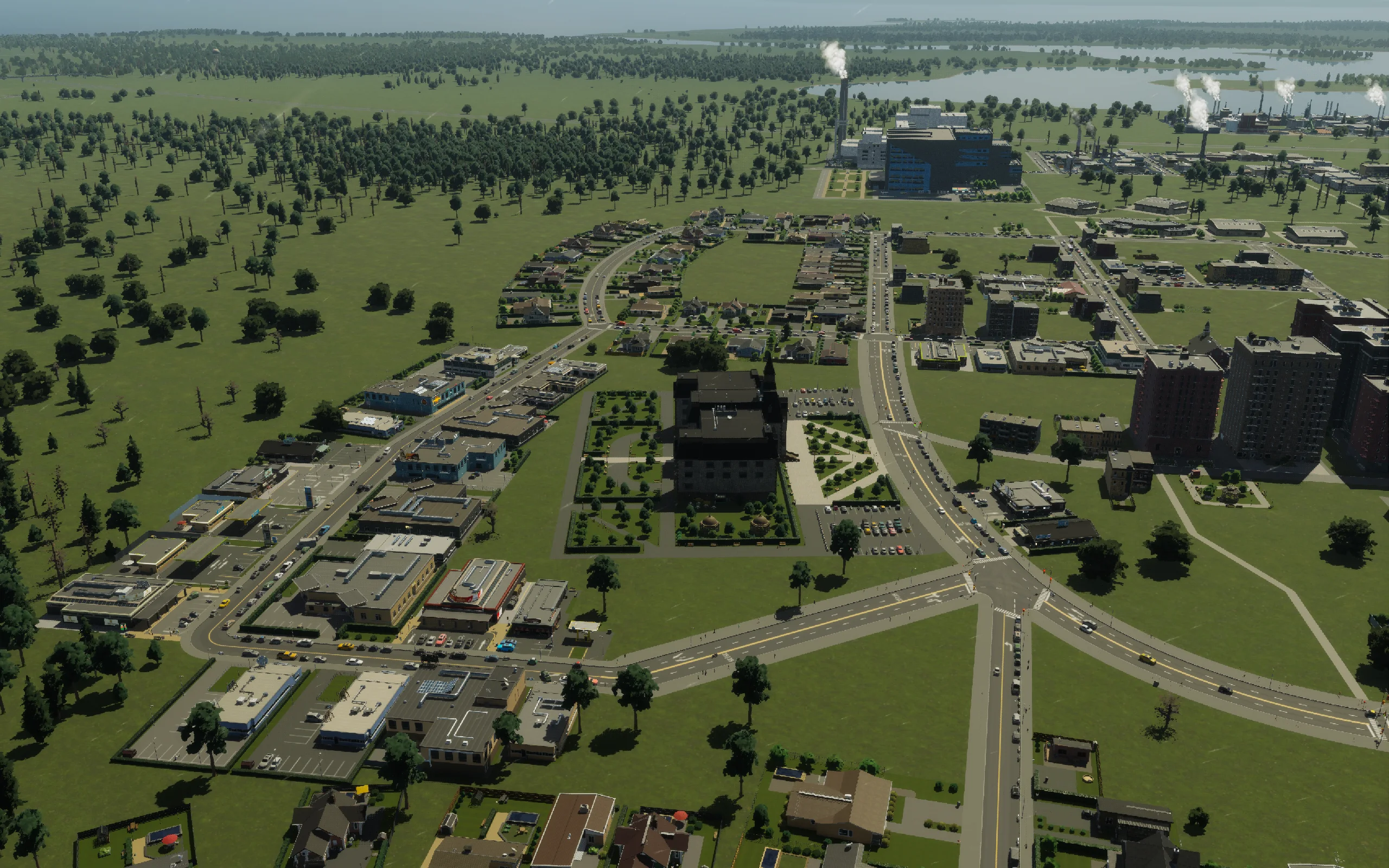 The closing campus view includes the redesigned junction and the new office frontage beside its second outlet.