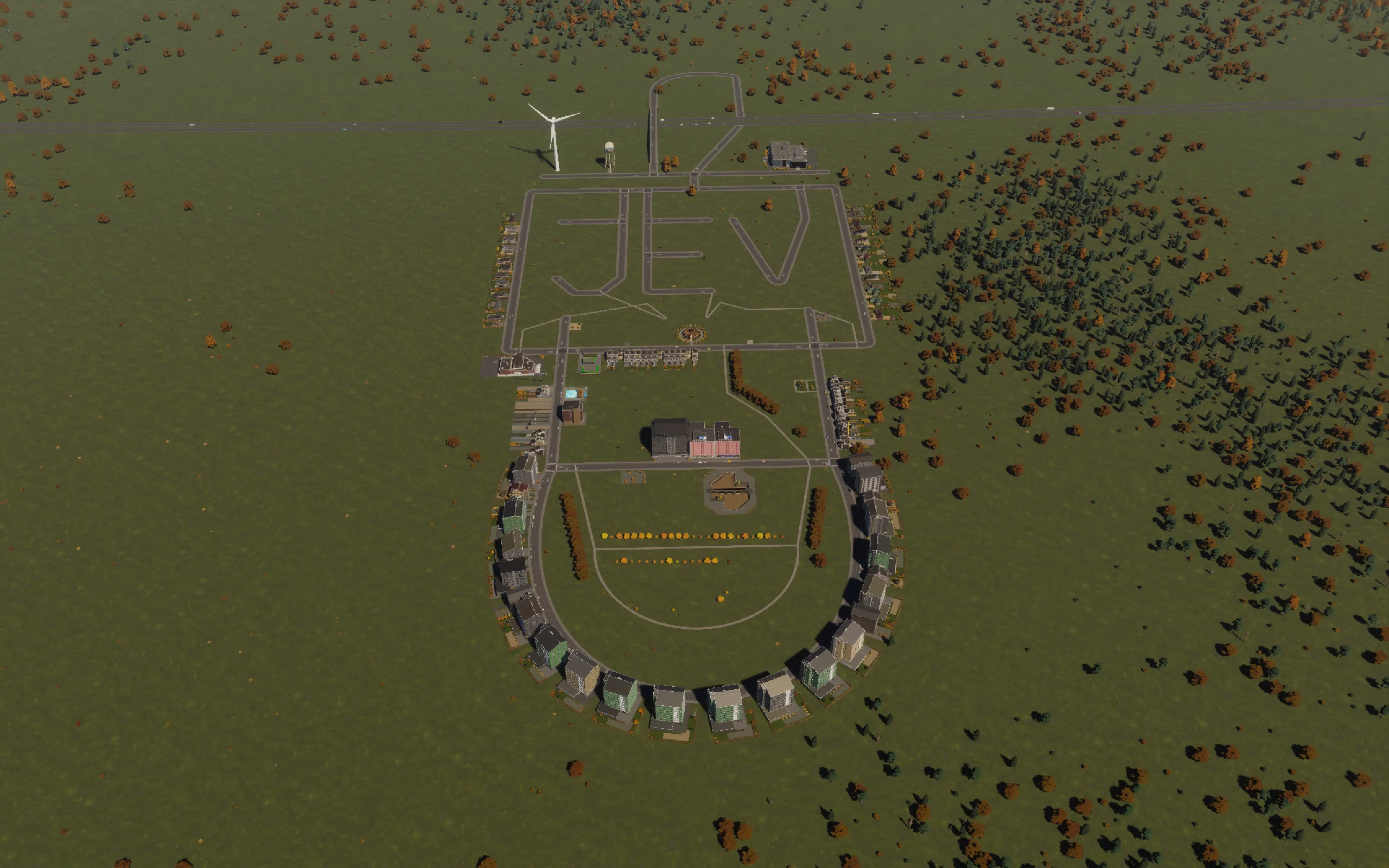 The complete neighborhood, with JEV streets above the crescent and the highway crossing beyond.