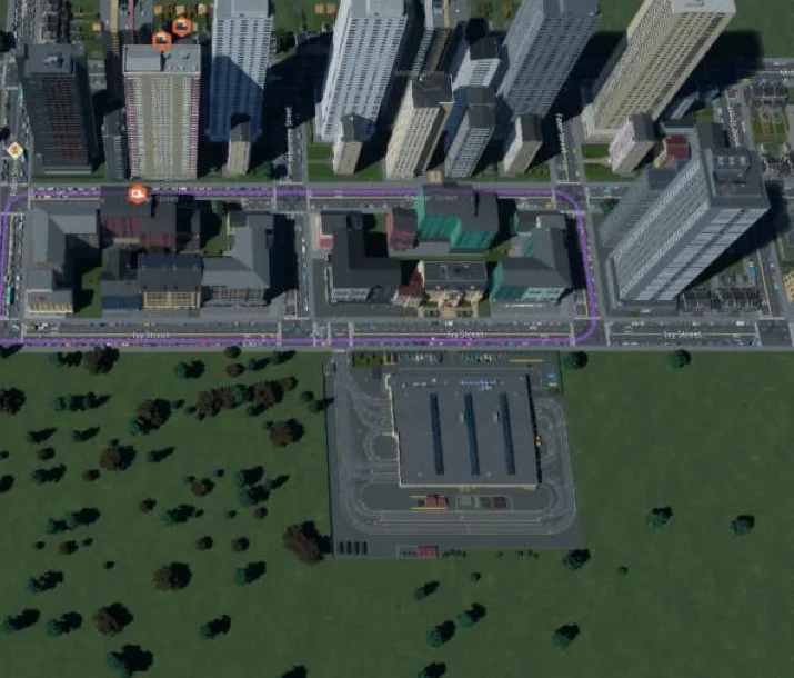 A purple tram line looping around a city block along Ivy Street, with the tram depot below