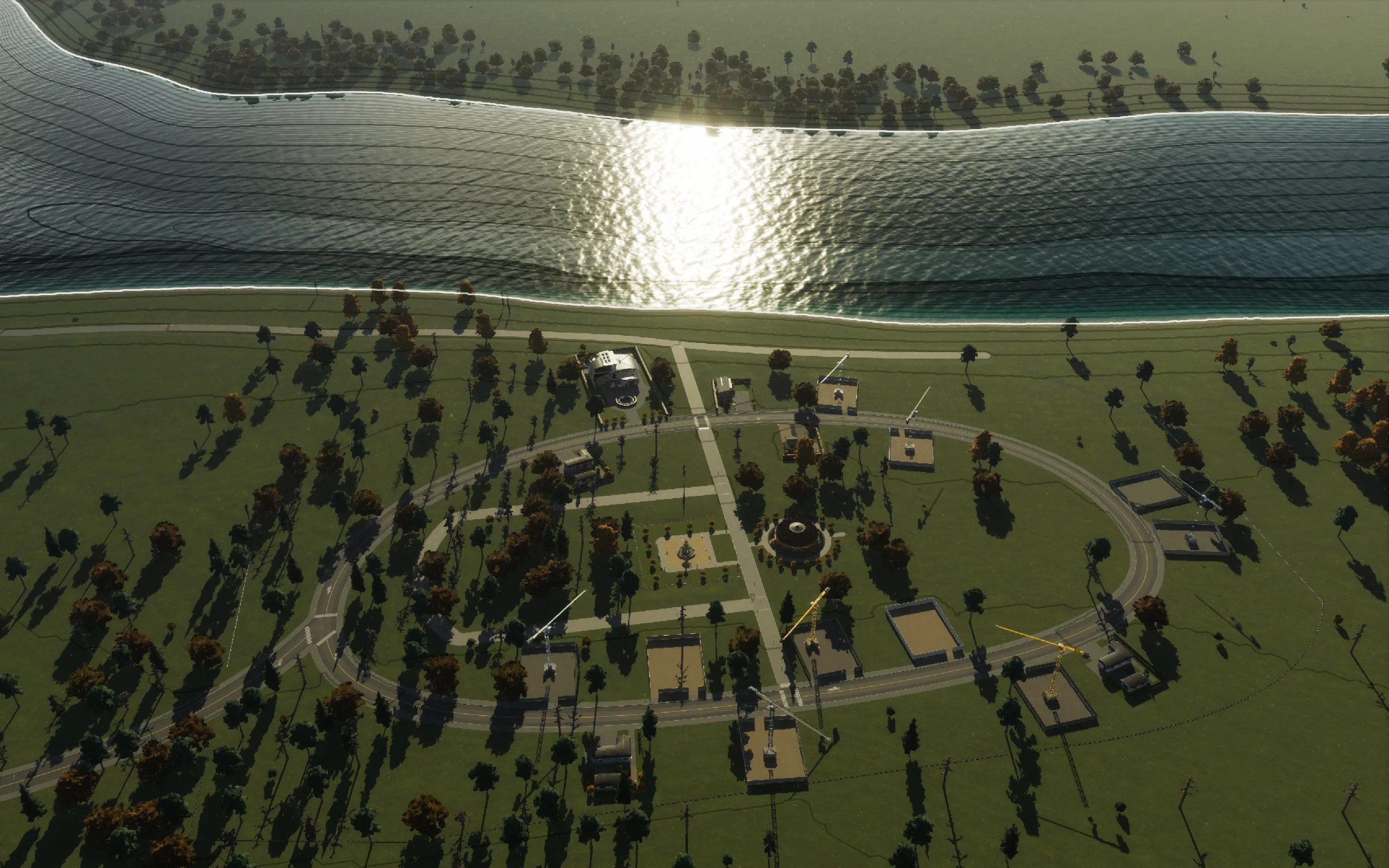 The first homes under construction, with the starter park, café, and river connection in place. The starter park was later replaced by Hedge Park.