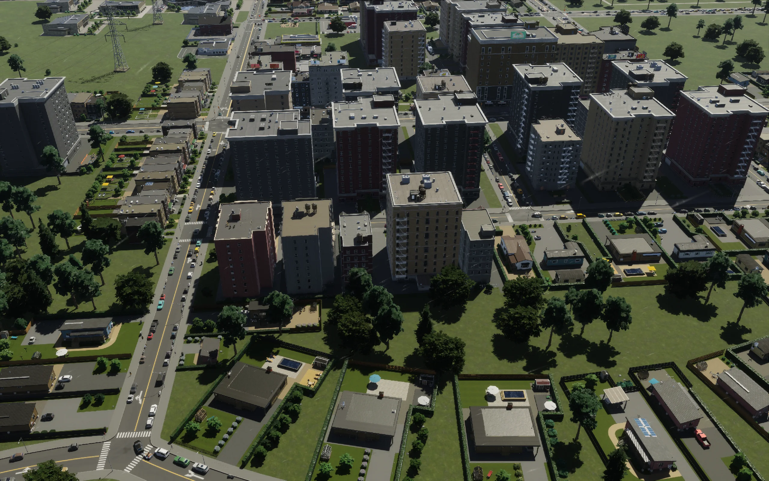 The same neighborhood later in the session, with the replacement apartment frontage built.