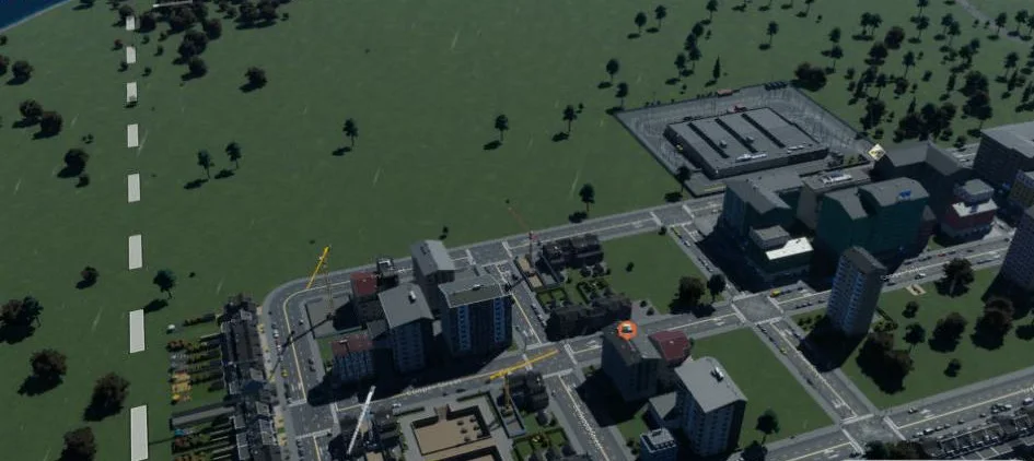 The eastern blocks under construction, with row houses, apartment buildings and a new park.